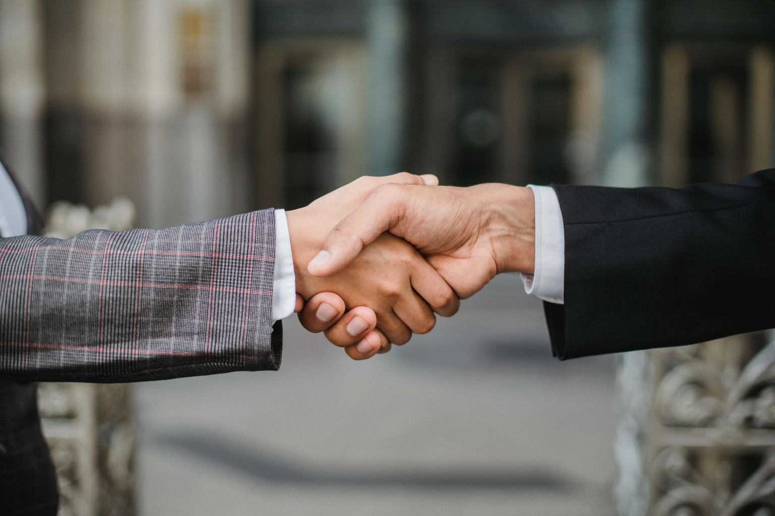 close up photo of handshake between two business men